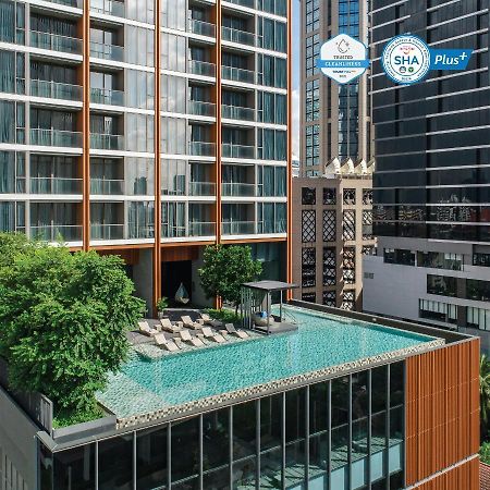 Oakwood Suites Bangkok - SHA Extra Plus Bagian luar foto The rooftop pool