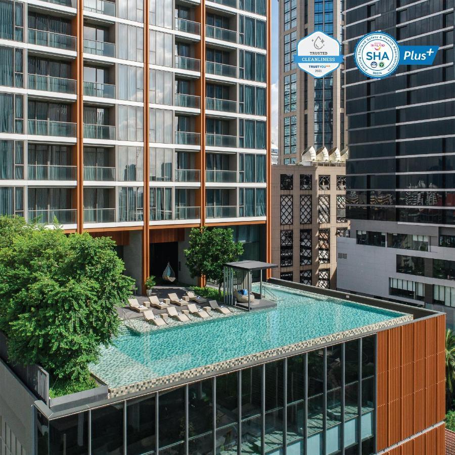 Oakwood Suites Bangkok - SHA Extra Plus Bagian luar foto The rooftop pool
